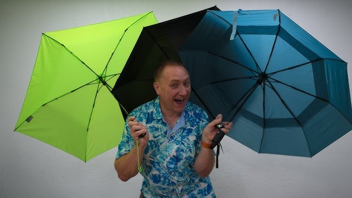 Small multicolor designer umbrella with curved handle and waterproof fabric for men and women