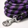 Purple and black braided dog leash with heavy-duty rope construction and metal snap hook for pet walking and training.